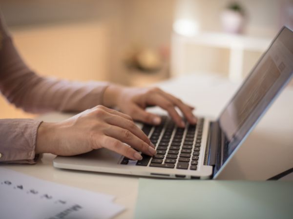 This photo is of someone on their laptop, reasearching so they understand their legal obligations for their new business. This is essential to the success of your business. 