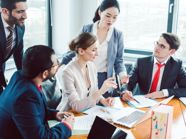 This photo is business owners discussing the right business structure for their business. 