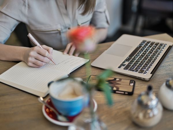 Photo of a business owner planing and focusing on local cotent. 