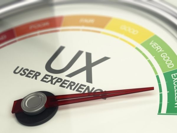 Speedometer-style gauge showing the term "UX User Experience" with the needle pointing toward the “Excellent” zone, representing optimal mobile site performance and user experience.