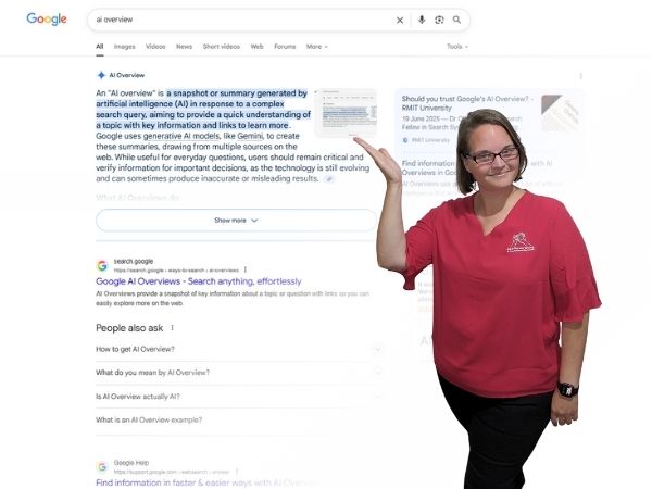 Ellie Clare from CLP Advertising pointing to a Google search result showing an AI Overview, highlighting the importance of businesses learning how to appear in AI Overviews.